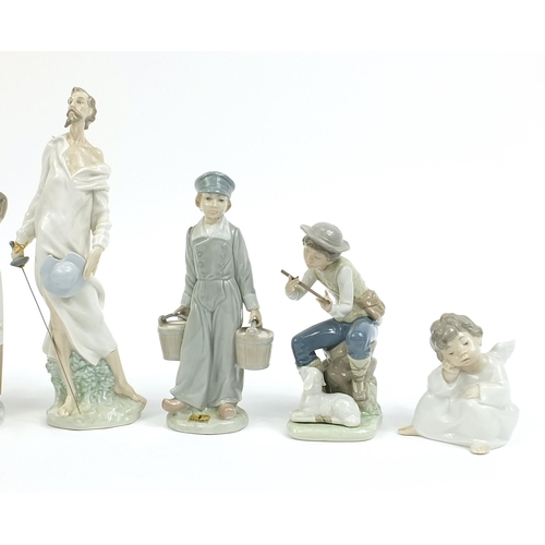 587 - Lladro and Nao porcelain figures including Don Quixote, the largest 29cm high