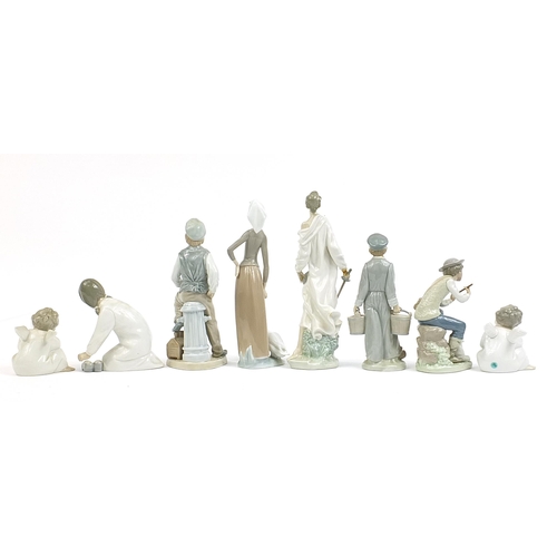 587 - Lladro and Nao porcelain figures including Don Quixote, the largest 29cm high