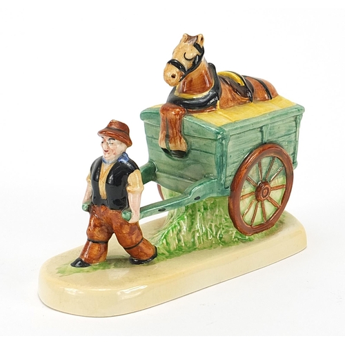 75 - Unmarked Carlton Ware drayman figure advertising Guinness, impressed marks to the base, 13.5cm in le... 