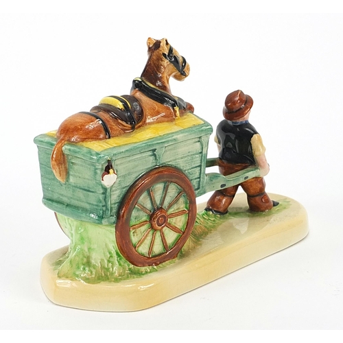 75 - Unmarked Carlton Ware drayman figure advertising Guinness, impressed marks to the base, 13.5cm in le... 