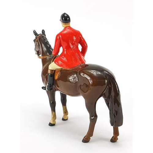 392 - Beswick huntsman on horseback, 22cm in length