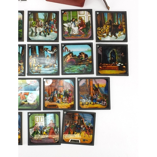 368 - Set of twenty four Victorian Peter Pan coloured glass magic lantern slides with fitted box and paper... 