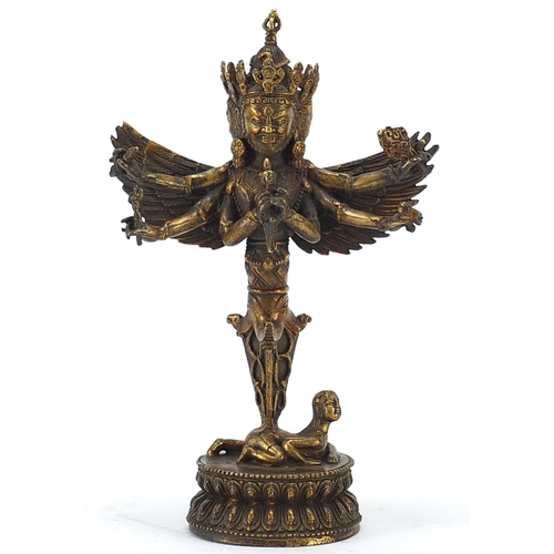 113 - Chino Tibetan gilt bronze deity, 27cm high