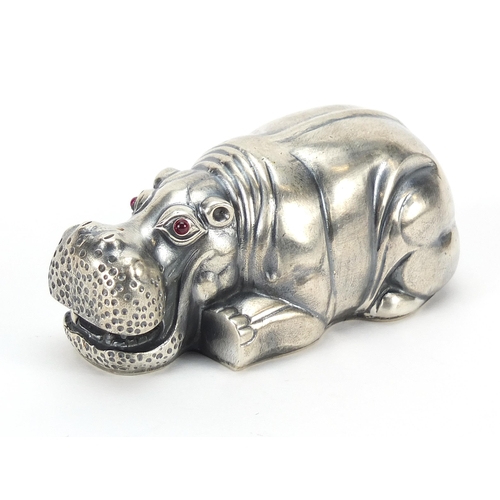 145 - Silver hippopotamus paperweight with ruby eyes, impressed Russian marks to the base, 7.8cm in length... 