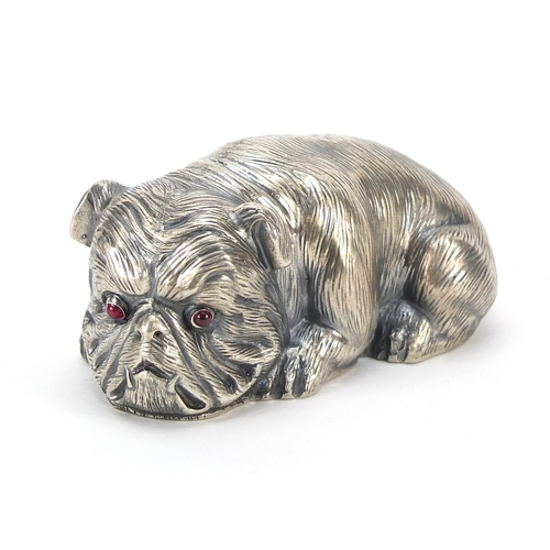 138 - Silver English Bulldog paperweight with ruby eyes, impressed Russian marks to the base, 6.5cm wide, ... 