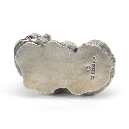 138 - Silver English Bulldog paperweight with ruby eyes, impressed Russian marks to the base, 6.5cm wide, ... 