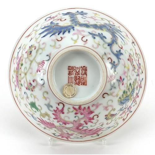 492 - Chinese porcelain bowl hand painted in the famille rose palette with phoenixes amongst flowers and s... 