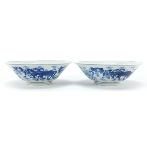 449 - Pair of Chinese blue and white porcelain bowls hand painted with horses, six figure character marks ... 