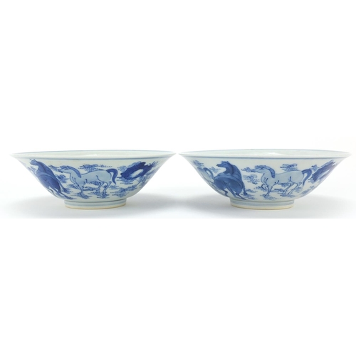 449 - Pair of Chinese blue and white porcelain bowls hand painted with horses, six figure character marks ... 