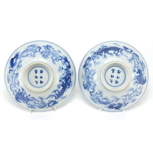 449 - Pair of Chinese blue and white porcelain bowls hand painted with horses, six figure character marks ... 