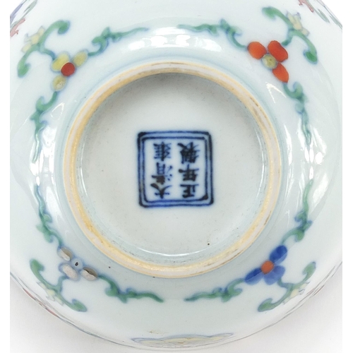 266 - Chinese doucai porcelain bowl hand painted with flowers, six figure character marks to the base, 11c... 