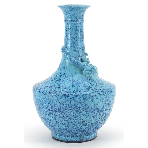 397 - Chinese porcelain vase having a blue glaze decorated in relief with a water dragon, impressed six fi... 