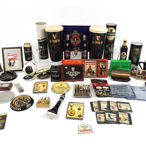 179A - Large collection of vintage and later Guinness advertising breweriana including two large ceramic gl... 