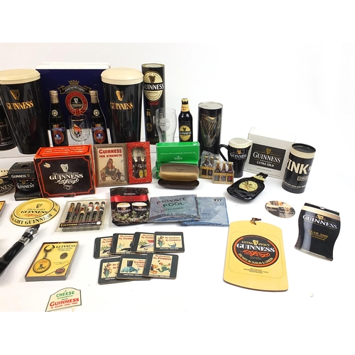 179A - Large collection of vintage and later Guinness advertising breweriana including two large ceramic gl... 