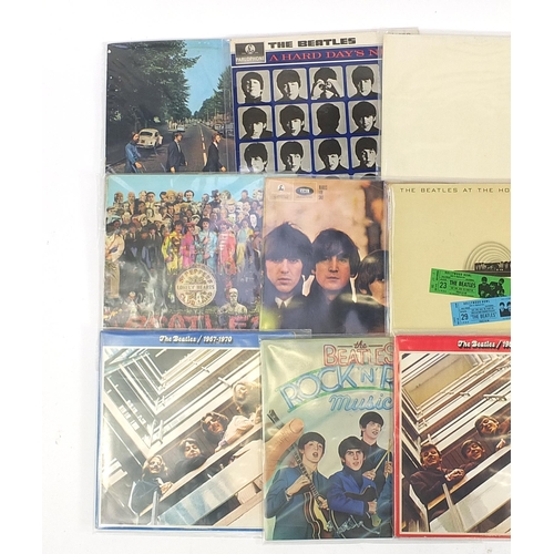 623 - The Beatles vinyl LP's including The White Album with poster and four photographs, Abbey Road, Pleas... 