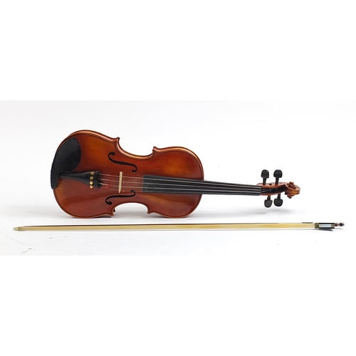 499 - The Arcadia violin by Stentor with bow and protective case, the back 37cm in length