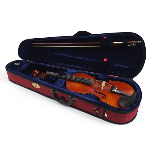 499 - The Arcadia violin by Stentor with bow and protective case, the back 37cm in length