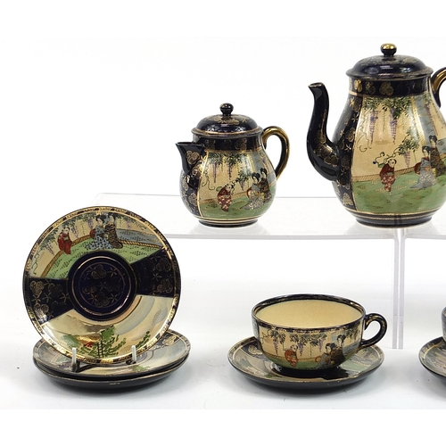 567 - Japanese Satsuma part tea service including teapot, sugar bowl and milk jug, the teapot 16cm high