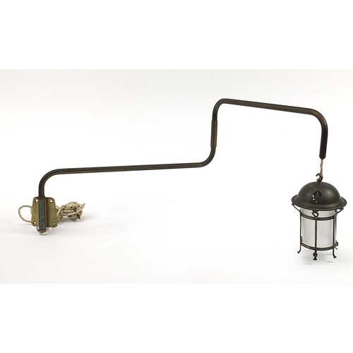 130 - Art Nouveau adjustable brass wall light with hanging lamp and frosted glass shade, 65cm high