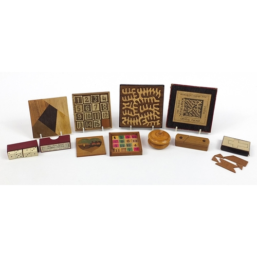 612 - Selection of Victorian and later treen dexterity puzzles including The Zig Zag Crystal Palace puzzle... 