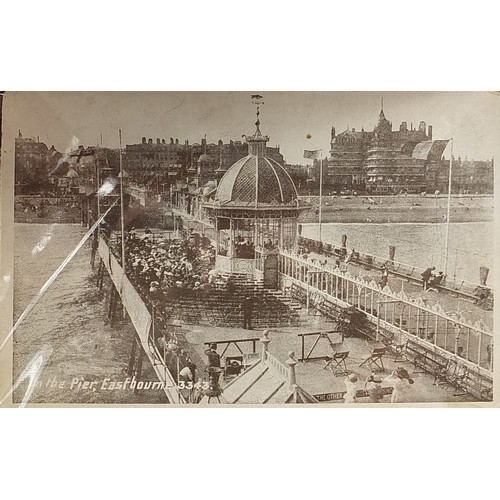 363 - Collection of early 20th century and later Eastbourne postcards arranged in an album titled Pier to ... 