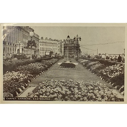 363 - Collection of early 20th century and later Eastbourne postcards arranged in an album titled Pier to ... 