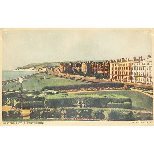 364 - Collection of early 20th century and later Eastbourne postcards arranged in an album titled Beachy H... 