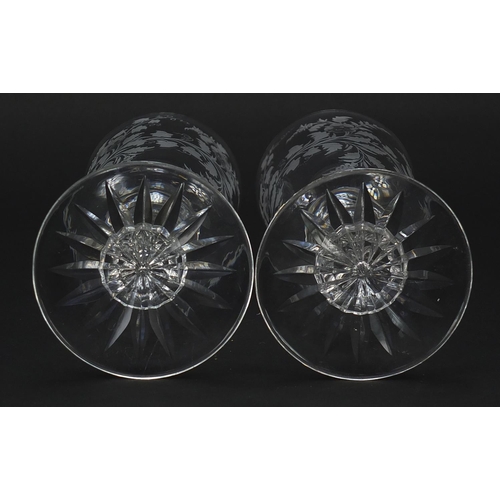 44 - Pair of Edwardian wine glasses etched with leaves and berries, each 18.5cm high