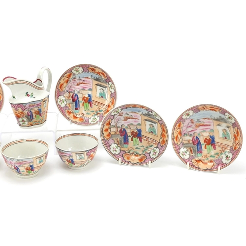 84 - 18th century Newhall teaware including a milk jug and saucers hand painted in the chinoiserie manner... 