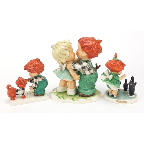 588 - Three Goebel Hummel figures, the largest 14cm high