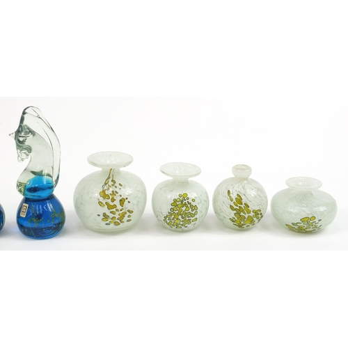 568 - Mdina glass paperweights and vases including  two seahorse paperweights, the largest 16cm high