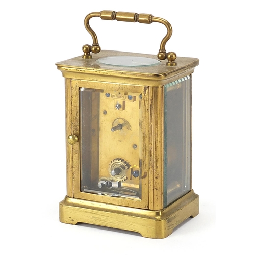 331 - French brass cased carriage clock with enamelled dial having Roman numerals, 10.5cm high