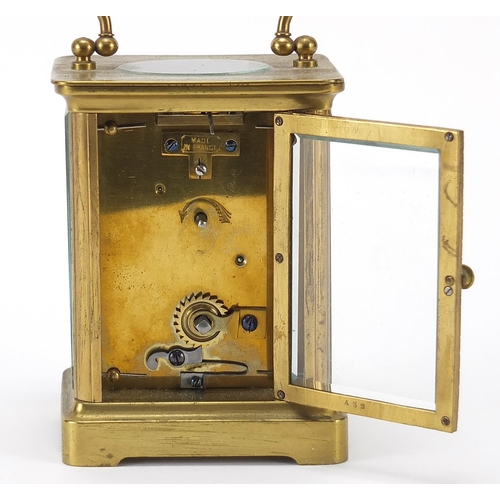 331 - French brass cased carriage clock with enamelled dial having Roman numerals, 10.5cm high