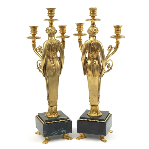 215 - Large pair of French Empire style gilt bronze figural three branch candelabras raised on square marb... 