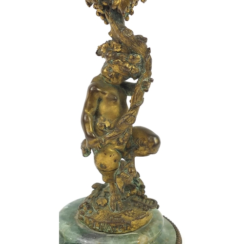 217 - Gilt bronze Putti table lamp with fluorite style base, 47cm high