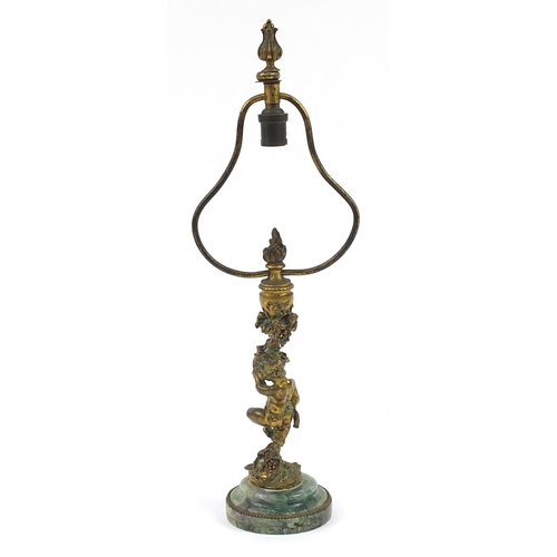 217 - Gilt bronze Putti table lamp with fluorite style base, 47cm high