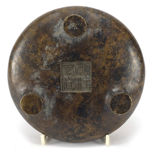 405 - Chinese patinated bronze tripod censer, character marks to the base, 16cm in diameter