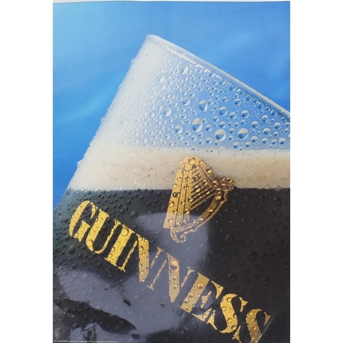 180A - Large collection of Guinness advertising breweriana including glasses, ashtrays, album of postcards,... 