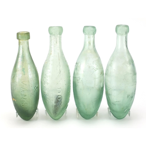 86 - Four 19th century Hamilton glass bottles including examples advertising Evans of Dublin and Webb's D... 