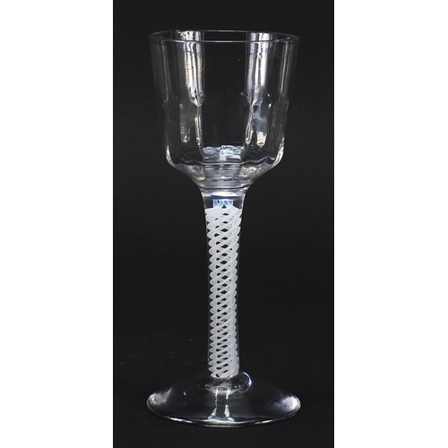 191 - 18th century wine glass with opaque twist stem and facetted bowl, 15cm high