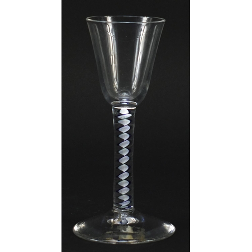 338 - Antique wine glass with blue and white opaque twist stem, 15cm high