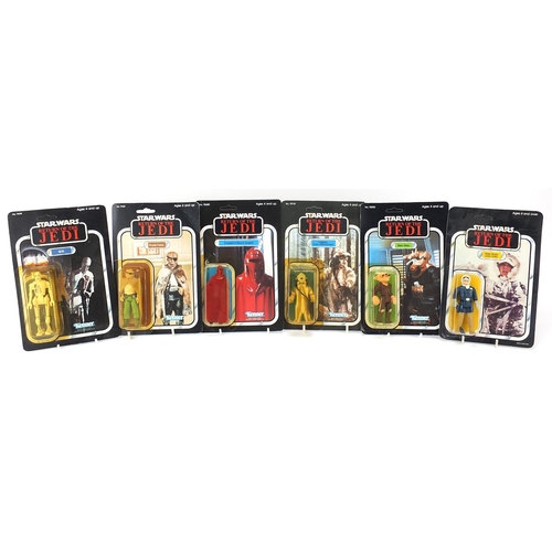 603 - Six 1980's Star Wars figures in sealed blister packs by Kenner including Emperor's Royal Guard