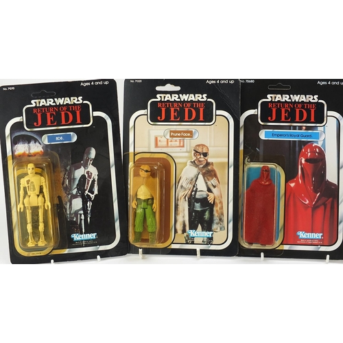 603 - Six 1980's Star Wars figures in sealed blister packs by Kenner including Emperor's Royal Guard