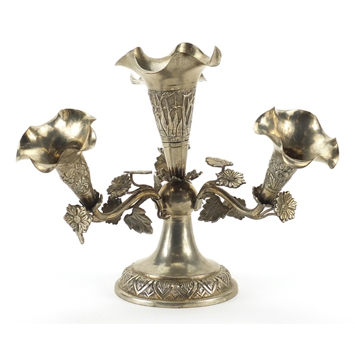 162 - Anglo Indian silver coloured metal four branch epergne embossed with flowers, 298.8g