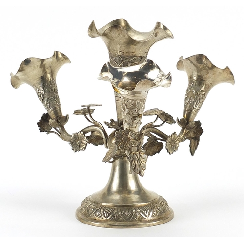 162 - Anglo Indian silver coloured metal four branch epergne embossed with flowers, 298.8g