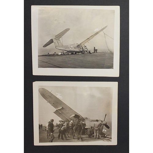 471 - World War II black and white photograph album relating to HMS Rajah Roker class carrier, including p... 