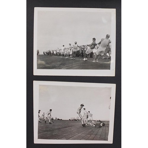 471 - World War II black and white photograph album relating to HMS Rajah Roker class carrier, including p... 