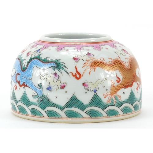 157 - Chinese porcelain beehive water pot hand painted in the famille rose palette with two dragons chasin... 