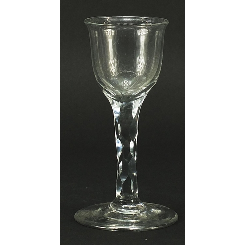 342 - 18th century wine glass with facetted stem, 14cm high