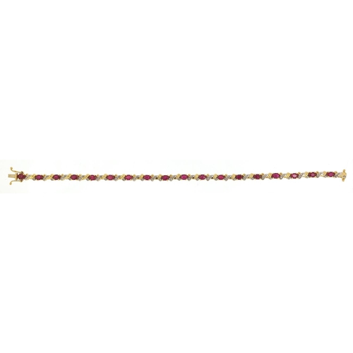 648 - 18ct gold ruby and diamond bracelet, 19cm in length, 12.4g